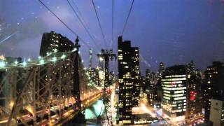 The Roosevelt Island tramway to New York City at night
