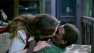 Poor black man and beautiful white girl kissing