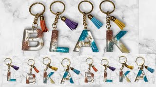 resin keychains with colourful stones #resinkeychain #resinkeyrings #resinart