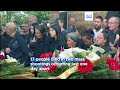 serbia mourns as funerals for mass shooting victims begin