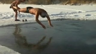 Winter Swimmers Brave Freezing Water and Snow