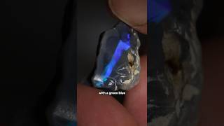 Cutting a nice piece of rough opal. #opal #gemstone