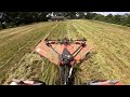 mowing a hay field full of weeds and sage.