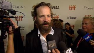 The Magnificent Seven: Peter Sarsgaard "Bogue" TIFF Movie Premiere Interview | ScreenSlam