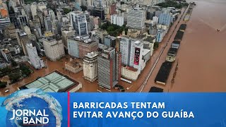 Barricadas são colocadas para conter avanço do Lago Guaíba | Jornal da Band