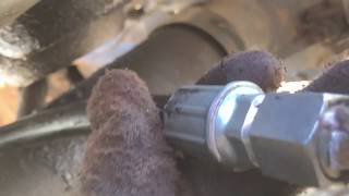 fixing a hydraulic fluid leak in a tractor