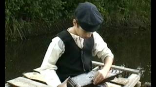 Kantele - Votic boy plaing votic traditional inatrument \