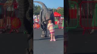 She’s determined to keep her head in the dinosaurs mouth! #dinomania #dinosaur #cute #funny