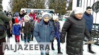 Refugees flee conflict zones as fighting intensifies in eastern Ukraine