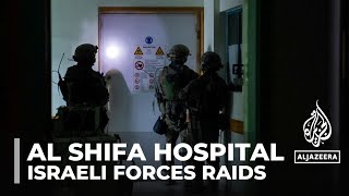 Israeli forces raid Al Shifa hospital thousands sheltering inside complex
