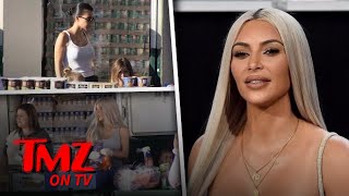 Kim and Kourtney Are In The Giving Spirit | TMZ TV