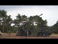 danish troops firing caesar 8x8 155 mm self propelled artillery system