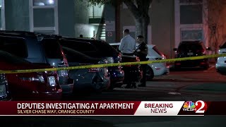 Investigators on crime scene early Friday morning in Orange County