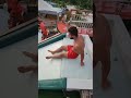 Double backflip from the slide challenge bluetree pool flip phuket travel bluetreephuket