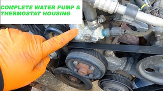 1999 - 2004 Jeep Grand Cherokee How to Replace Water Pump & Thermostat & Belt With Easy DIY