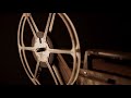 Static Shot Of Film Reel Spinning On Film Projector In 4K