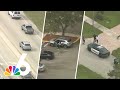 Watch aerial POLICE PURSUIT, foot chase in Broward end with suspect in custody