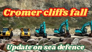 Cromer cliffs fall sea defence walk explore north Norfolk beach coastal erosion damage repairs pier