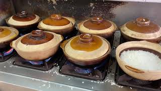 Chinese Street Food Beef、fish rice steamed in claypot  in Guangzhou, China