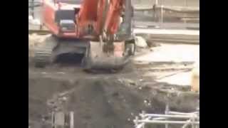 クレーンの妙技　perform a feat of crane-operator