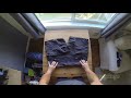 army packing hack how to roll cargo shorts for travel space saving camping vacation carry on