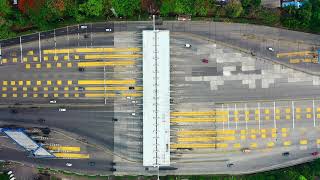 Aerial Footage Of Vehicles Passing Through A Toll Gate | No Copyright HD Videos