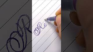 'Relax' cursive writing style.