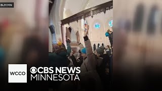 Video shows moments Minnesota protesters disrupted services at church with ICE pastor
