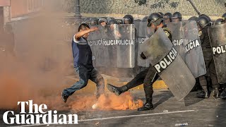 Teargas fired at Peru protesters as thousands try to 'take Lima'