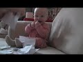 baby laughing hysterically at ripping paper original