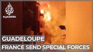 France to send special forces to Guadeloupe after looting, arson