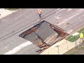 Massive sinkhole opens near Bank of America Stadium in Charlotte, North Carolina