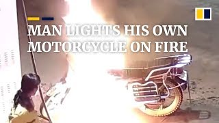 Drunk man in China lights his own motorcycle on fire