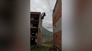 Stunt Daredevil's Terrifying Roof Jump Car Crash Using Lada