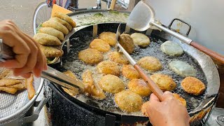 Garlic chives cake at Chhuk Meas Market  /នំគូឆាយមូលនៅផ្សារឈូកមាស