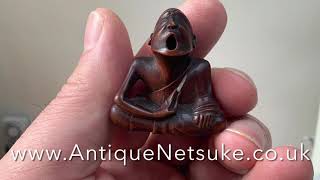 Antique Wood Netsuke with a Seated Sneezer 19thC