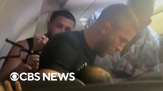 Former MMA fighter prevents man from opening plane emergency exit door during flight