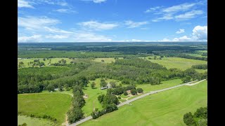 Farmhouse on 45+ Acres with Barn and Freshwater Pond