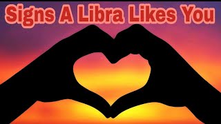 Signs a Libra likes you