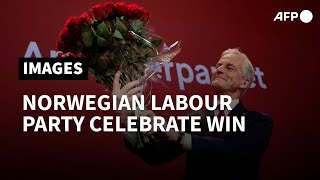 Norwegian Labour Party supporters cheers as initial election results come in | AFP