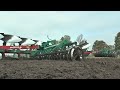 versatile 550dt with kverneland 12 furrow plough taking the next track on the headland