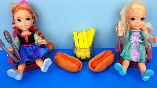 Barbecue ! Elsa and Anna toddlers - BBQ contest - Barbie - ketchup - hotdog burgers - picnic - food