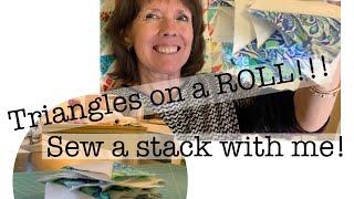 Sew some half square triangles using “triangles on a roll”- a quick way to make a LOT at one time!