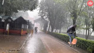 Sudden Heavy Rain-People Run to Take Shelter