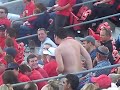 fat shirtless drunk guy dancing at nc state game