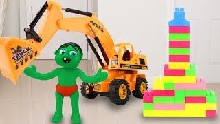 Play Doh Babies use Excavator to Build a Toy Castle with Blocks