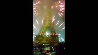 Fireworks light up the Eiffel Tower in Paris on Bastille Day 2015. A view from the Champs de Mars