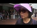 flowers candles left in tribute to hong kong protester