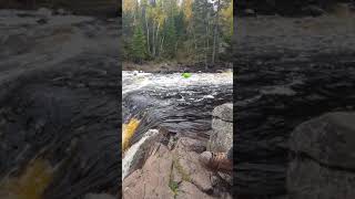 Kayak over Illgin Falls, Minnesota.