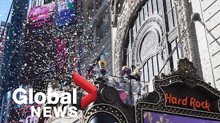 Confetti whips through Times Square ahead of scaled-back New Years Eve celebration